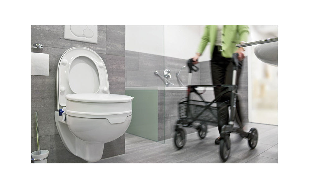 Elevador WC Comode Practica con patas regulables y reposabrazos