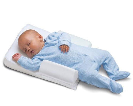 Importancia de las almohadas para bebes antireflujo – MomCiclopedia